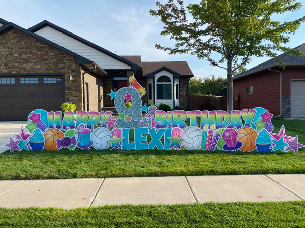 Meet the people behind the big celebratory yard signs